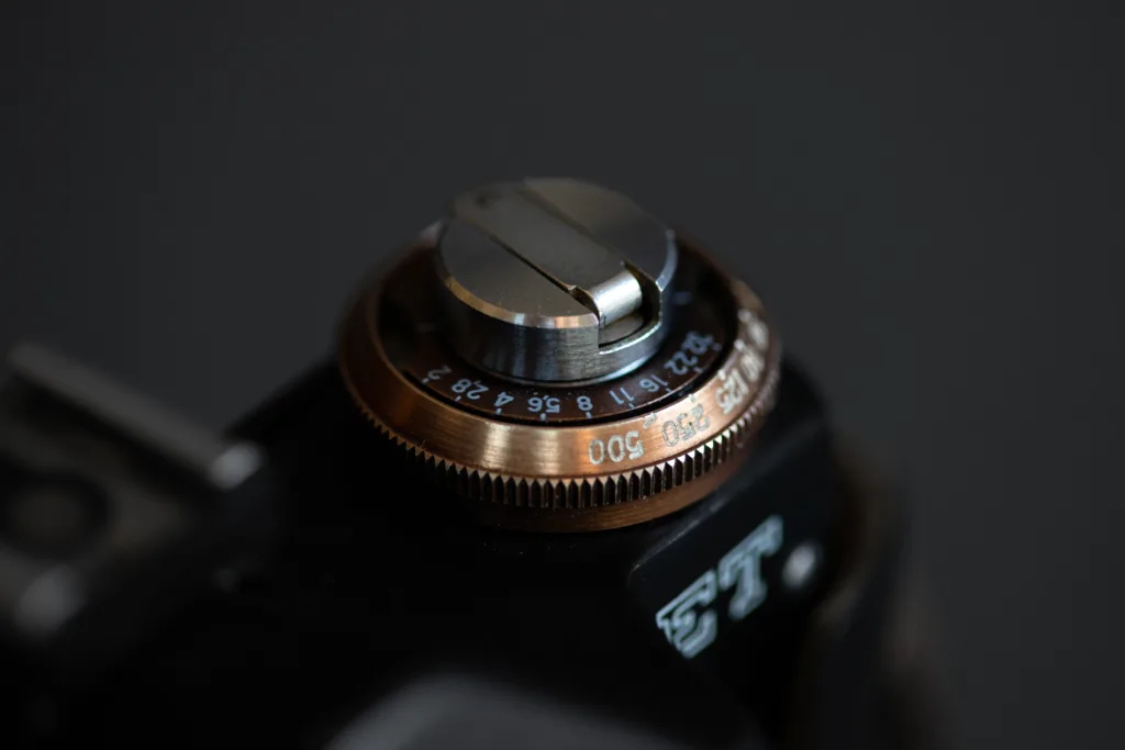 Bronze shutterspeed dial on Zenit-ET